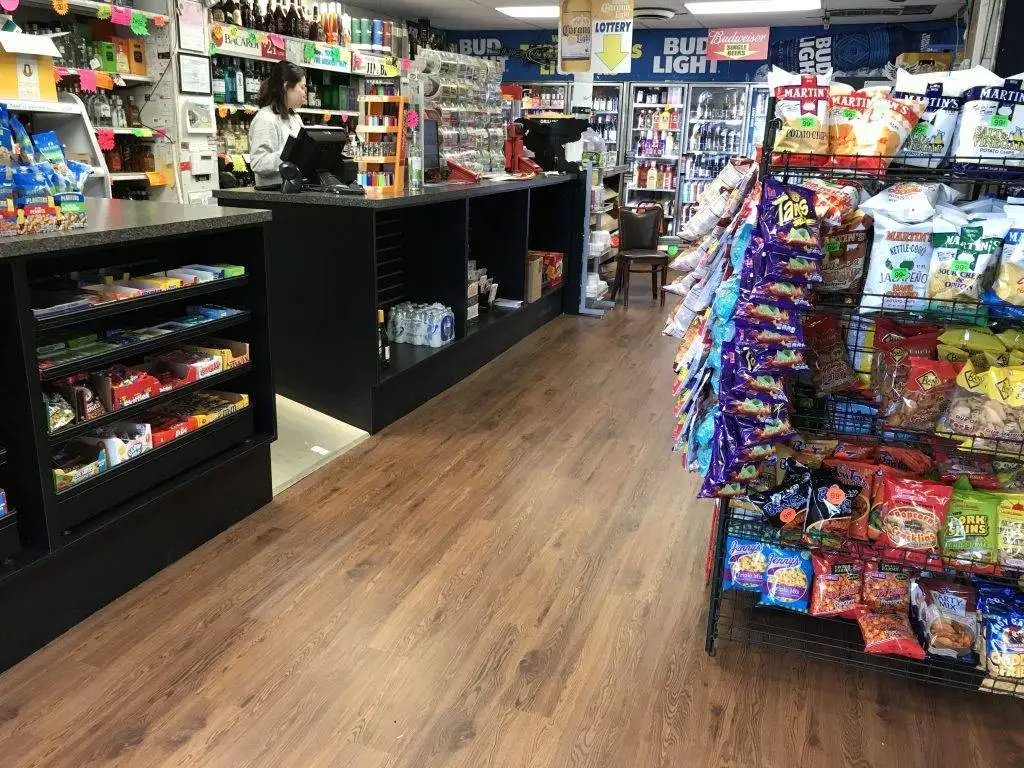 convenience store flooring and check-out counter shelving layout and flooring installation