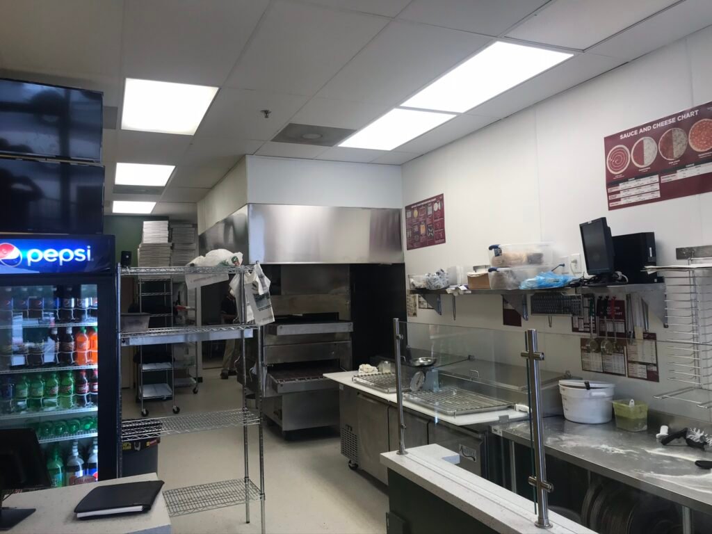 finished construction of an open kitchen pizza restaurant
