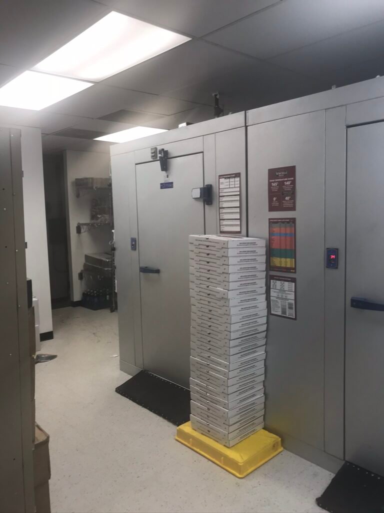 restaurant storage with installed commercial grade freezer and refrigerator